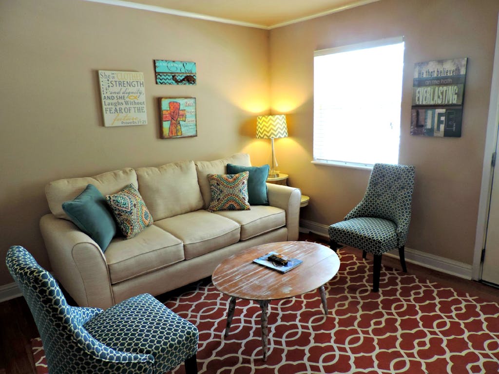 Bright living room with elegant furniture and modern decor, perfect for relaxation.